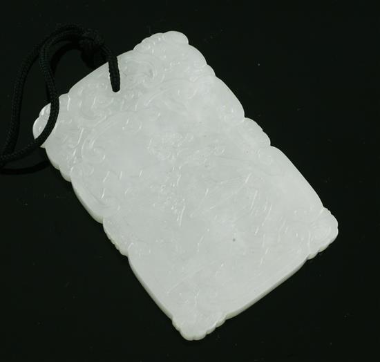 A Chinese white jade plaque, 19th/20th century, 6.5cm